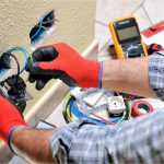 Electrician Repairing Socket — Electric Services in Emerald, QLD